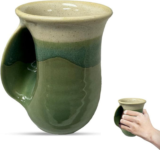 Clay in Motion Hand Warmer Coffee Mug – Handmade Coffee Mug With Comfortable Handle Contoured Pocket Hand Warming Ceramic Coffee Mug – Proudly Made in USA – Left Handed – 14 Oz - Grass Lands
