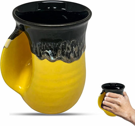 Clay in Motion Hand Warmer Coffee Mug – Handmade Coffee Mug With Comfortable Handle Contoured Pocket Hand Warming Ceramic Coffee Mug – Proudly Made in USA – Left Handed – 14 Oz - Yellow Black