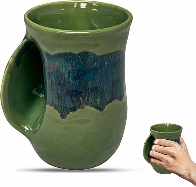 Clay in Motion Hand Warmer Coffee Mug – Handmade Coffee Mug With Comfortable Handle Contoured Pocket Hand Warming Ceramic Coffee Mug – Proudly Made in USA – Left Handed – 14 Oz - Misty Green