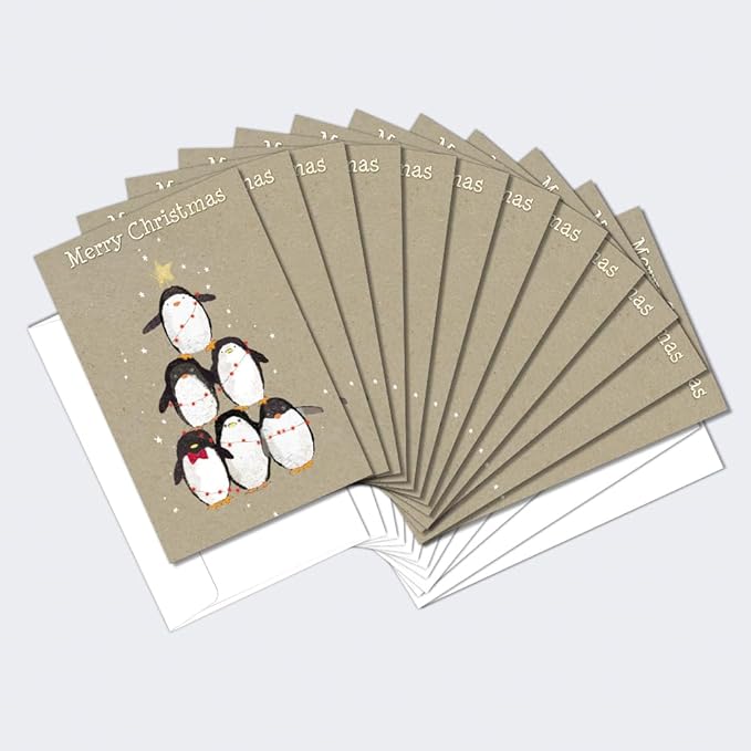 Tree-Free Greetings - Season's Greeting Card - Artful Designs - 1 Card + Matching Envelopes - Made in USA - 100% Recycled Paper - 5"x7" - Penguin Pile (FS93532)