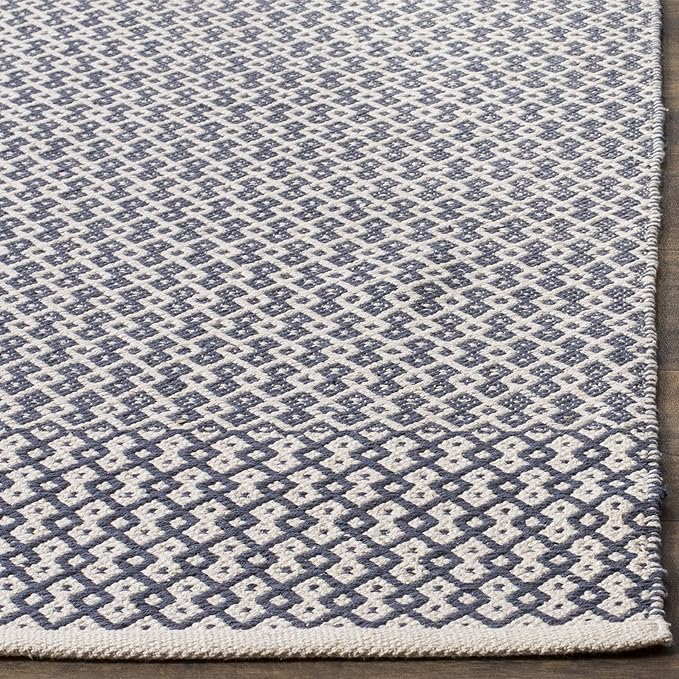 SAFAVIEH Montauk Collection Area Rug - 9' x 12', Ivory & Navy, Handmade Flat Weave Boho Farmhouse Cotton, Ideal for High Traffic Areas in Living Room, Bedroom (MTK339B)